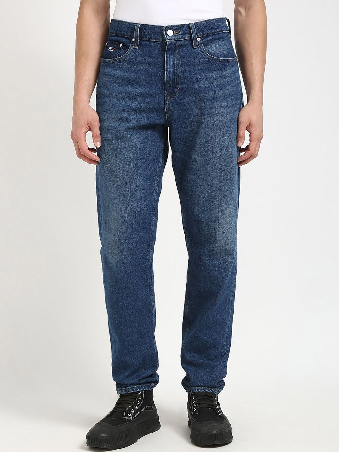 17fc304e-bd77-4518-b732-97f7dc6d1bfa1736594507858TommyHilfigerMenRelaxedFitLowDistressLightFadeJeans1.jpg Men Relaxed Fit Low Distress Light Fade Jeans - Image 1