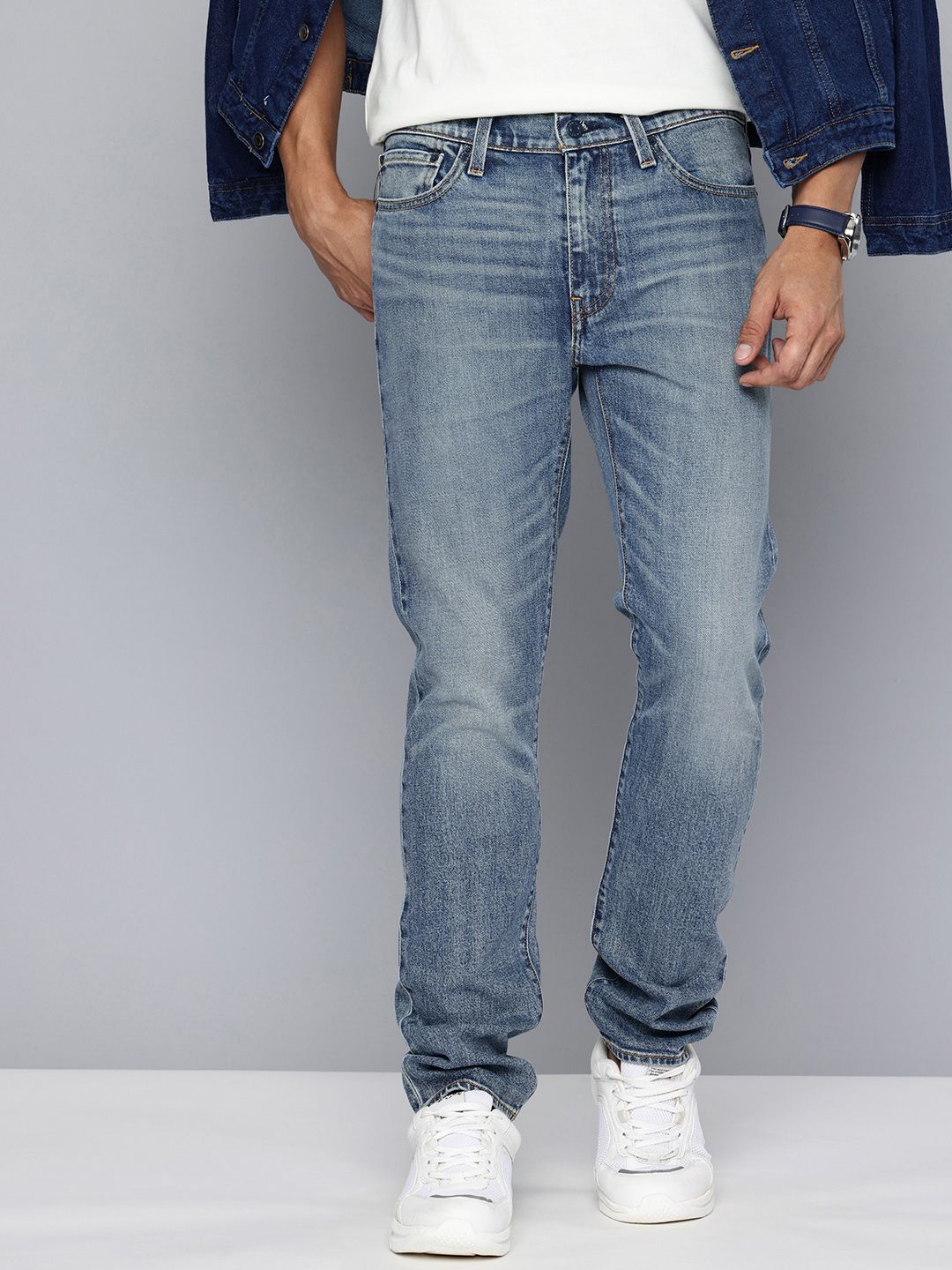 566c21d8-fc2c-4536-8992-0f03a456177f1742213465422-Mens-511-Slim-Fit-Blue-Jeans-2841742213464808-1.jpg Men 511 Slim Fit Light Fade Stretchable Jeans - Image 1
